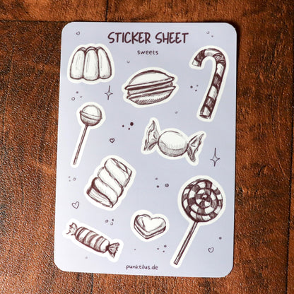 Detailaufnahme der glänzenden Bonbon-Sticker im Skizzen-Stil.
