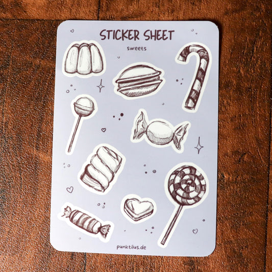Detailaufnahme der glänzenden Bonbon-Sticker im Skizzen-Stil.
